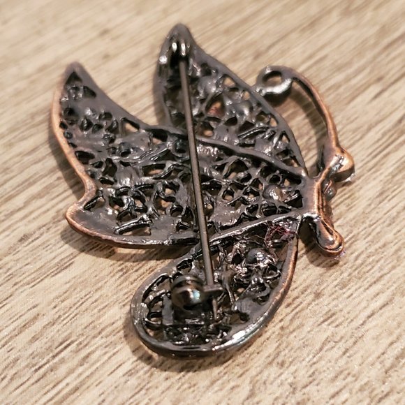 Woven bronze butterfly pin studded with pink rhinestones - Picture 2 of 2